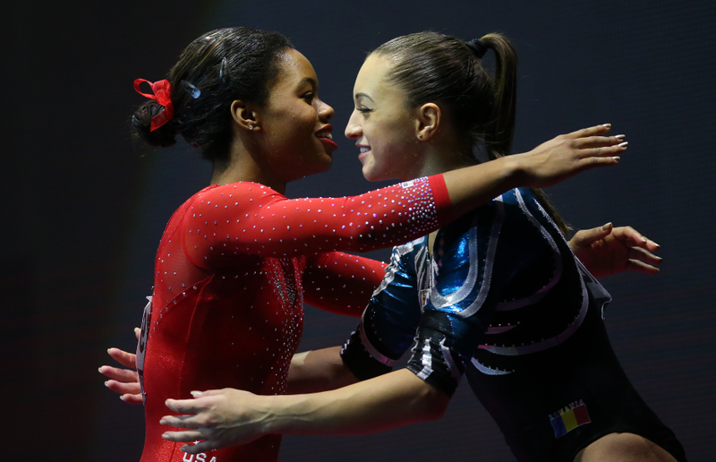 Larisa Iordache with Gabby Douglas at the 2015 World Championships (Ian MacNicol/Getty)